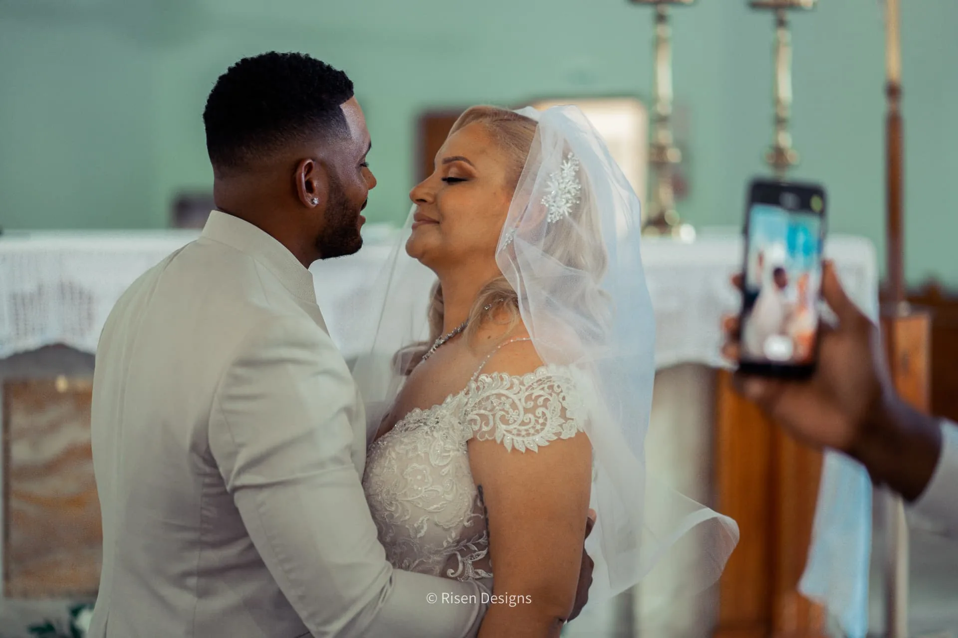 Whitney & Nicholas — A quiet moment at the altar