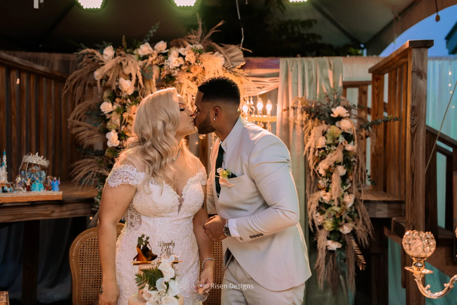 Whitney & Nicholas — A kiss at the cake