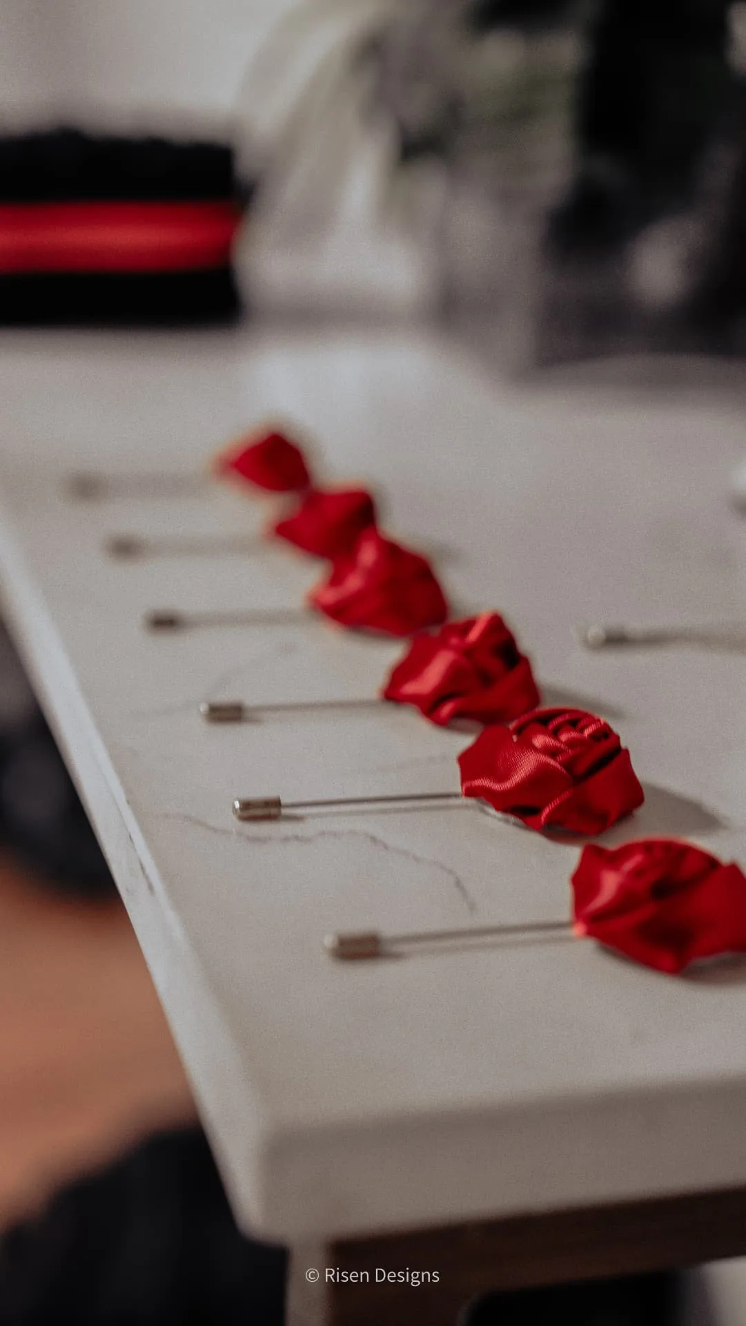 Cydni & Kolin — Lapel pins, lined up