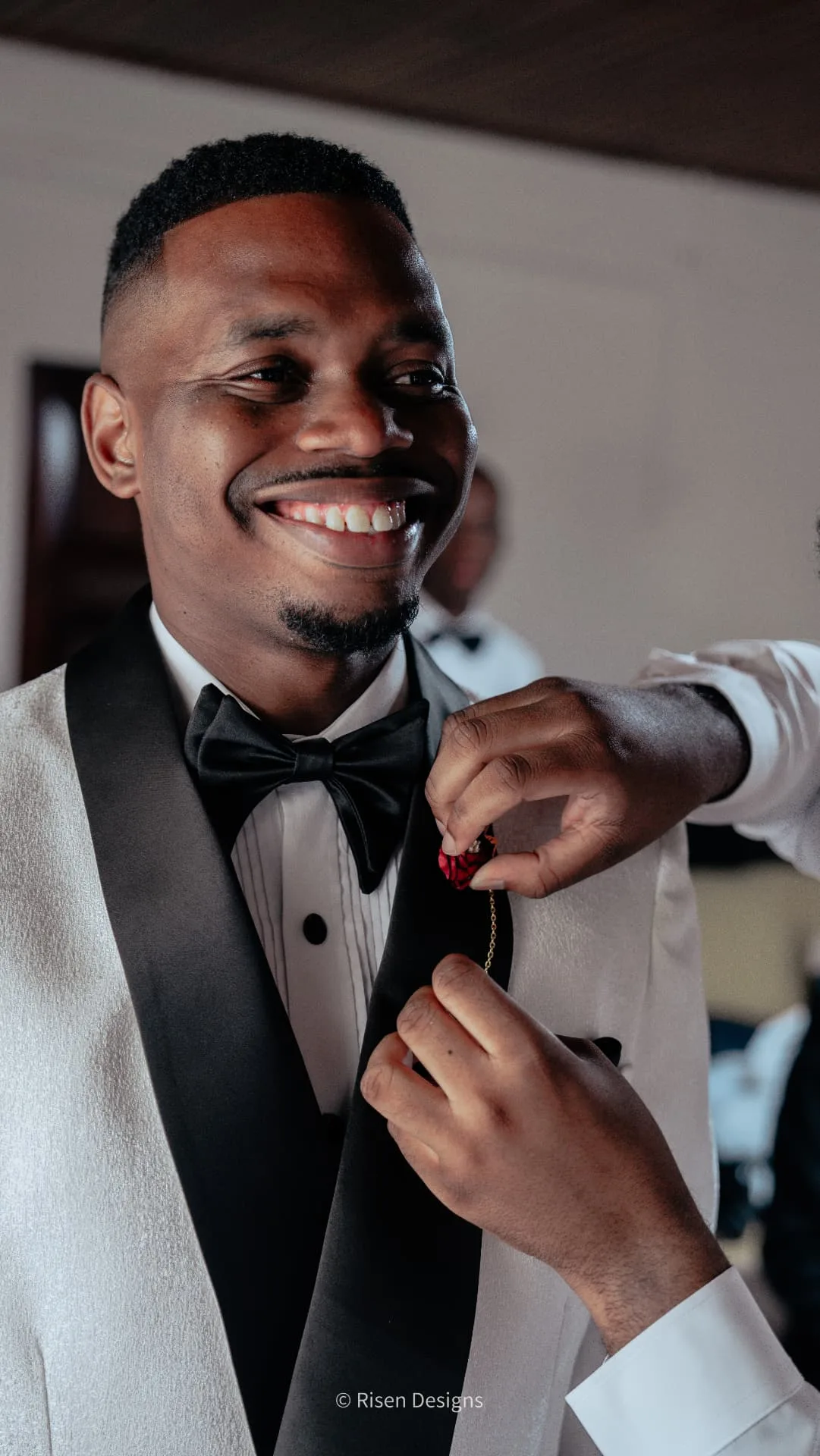 Cydni & Kolin — Pinning the boutonnière